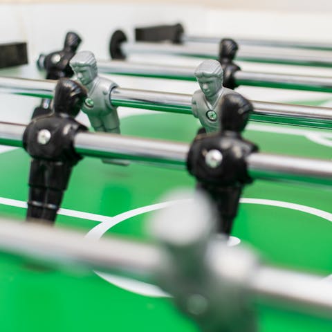 Take on family and friends in a game of table football