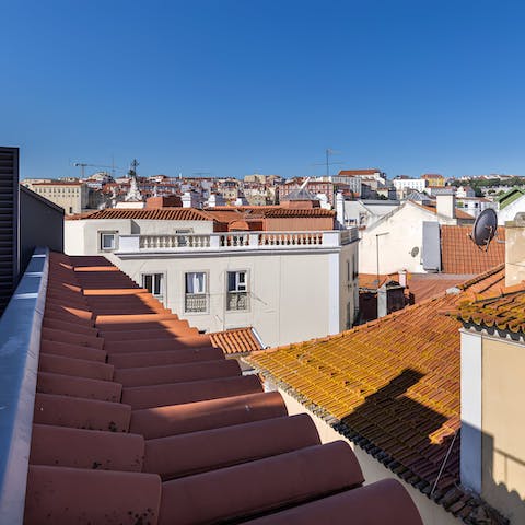 Take in the views over Lisbon's terracotta rooftops and beyond