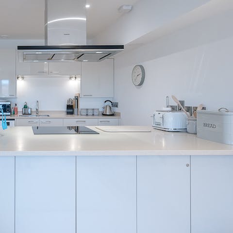 Rustle up brunch in the sleek, modern kitchen