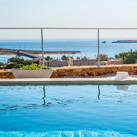 Swim across the private pool and admire the Aegean sea
