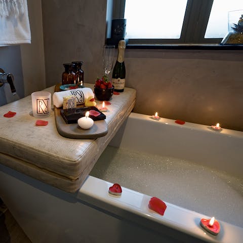 Feel yourself relax in a hot bubble bath after a busy day exploring