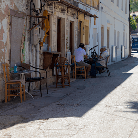 Take a 10-minute stroll into charming Ozias for an evening meal
