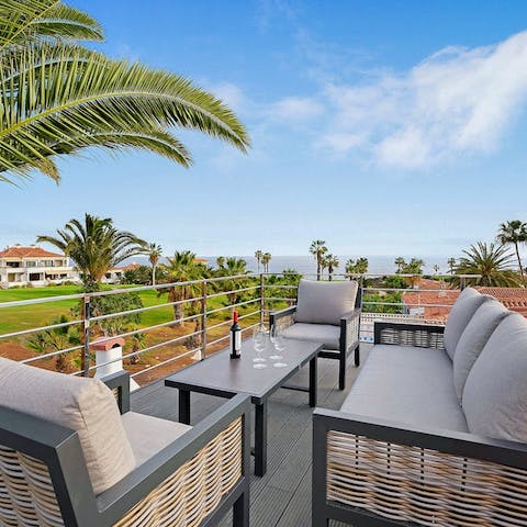 Admire views of the Atlantic Ocean as you sip a cocktail on the upper terrace