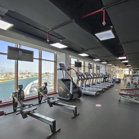 Gaze out at the harbour as you work up a sweat on the rowing machine