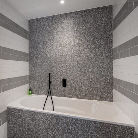 Sink into a hot bath in your en-suite at the end of a busy day