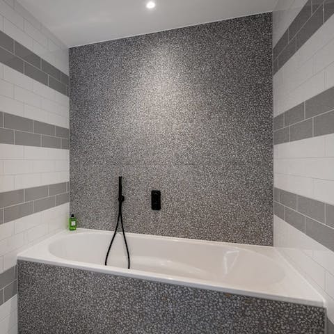 Sink into a hot bath in your en-suite at the end of a busy day