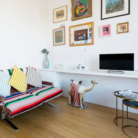 Fall in love with the quirky artwork and cosy furnishings 