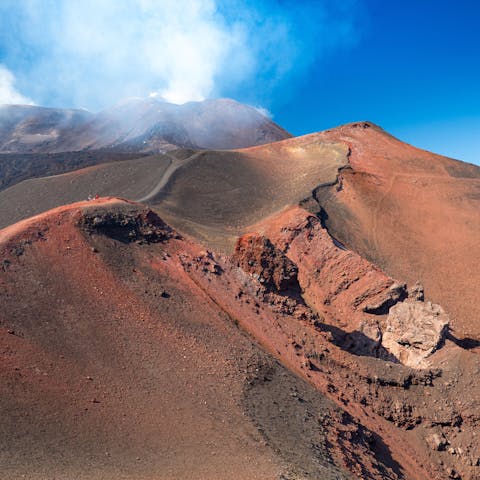 Hike up Mount Etna, it's a short drive away