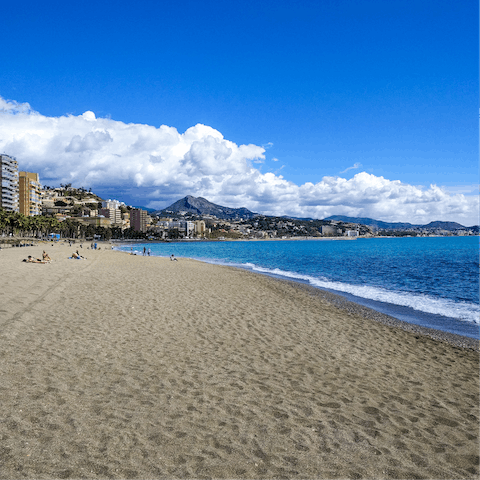Enjoy a stroll along Malagueta Beach on balmy afternoons