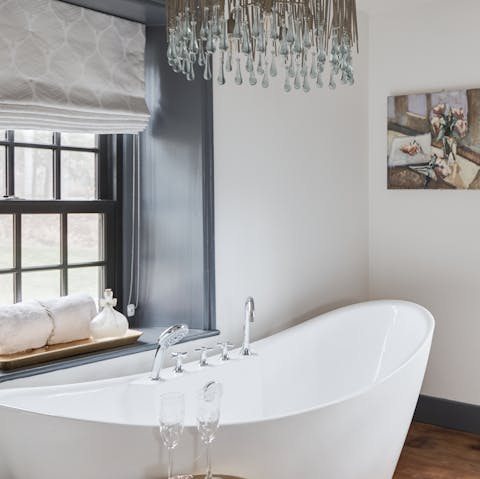 Soak in the main bedroom's bathtub after spending the day outdoors