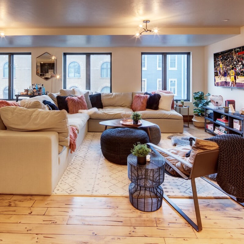 Make yourself at home on the plush L-shaped sofa