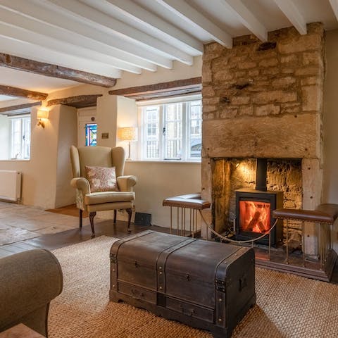 Cosy up in front of the log burner fire, after a country walk in the Cotswolds