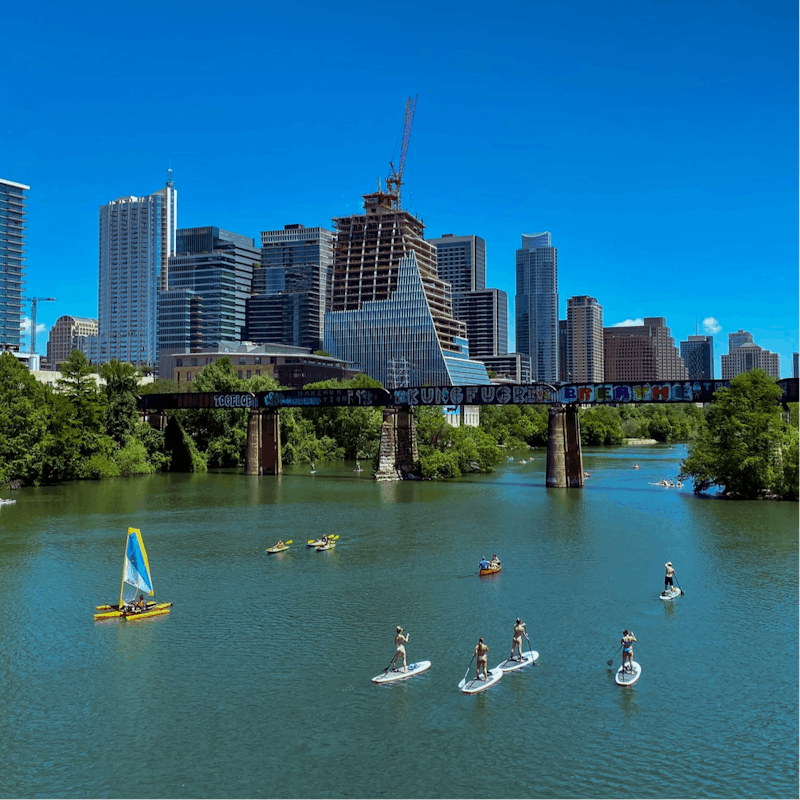 Spend the day at Lady Bird Lake, a ten-minute drive from this home