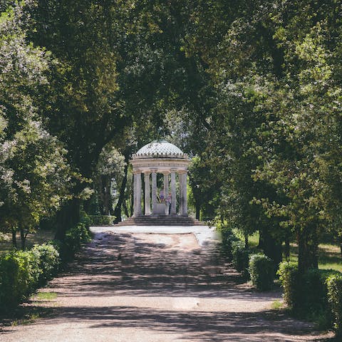 Take a stroll through Villa Borghese's beautiful gardens, a thirteen-minute walk away