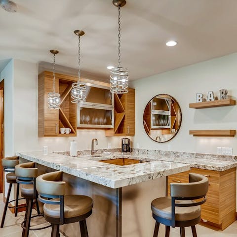 Enjoy a drink at the in-house bar