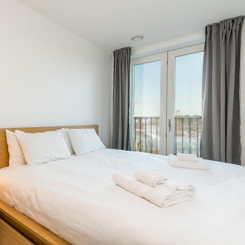 Wake up to a view of East London's rooftops out of the French doors in the bedroom