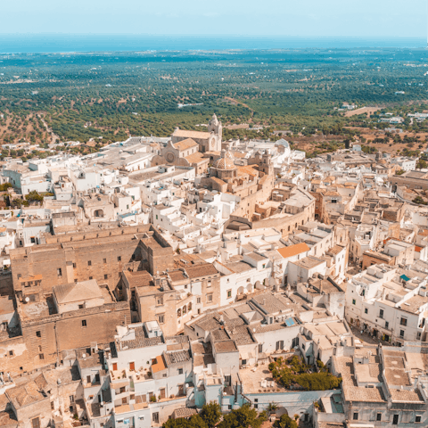 Schedule in a day trip to the beautiful hilltop town of Ostuni