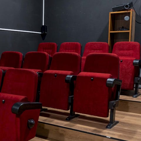 Settle down for a family movie night in the projection room