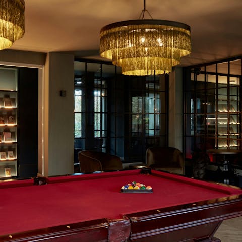 Unwind with a game of pool in the stylish communal space