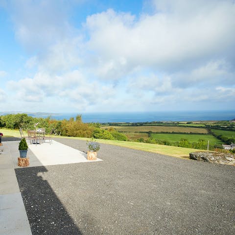 Enjoy dinner on the terrace as you drink in the far-reaching sea views