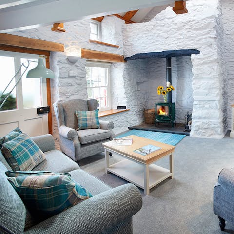 Cosy up by the wood burner after exploring the Pembrokeshire Coast