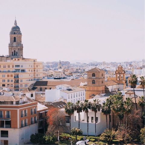 Explore Malaga's historic centre, twenty minutes away on public transport