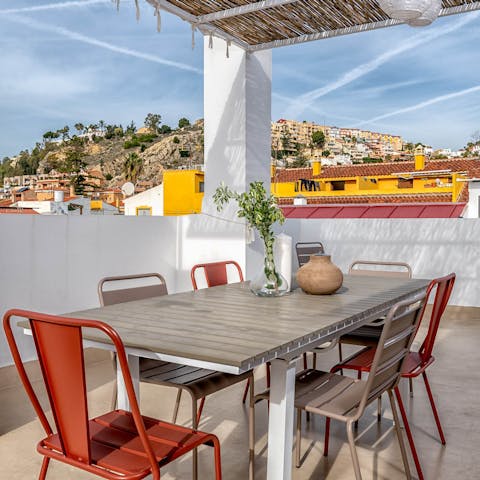 Relax on the rooftop terrace and admire picturesque views