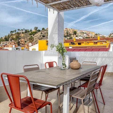 Relax on the rooftop terrace and admire picturesque views