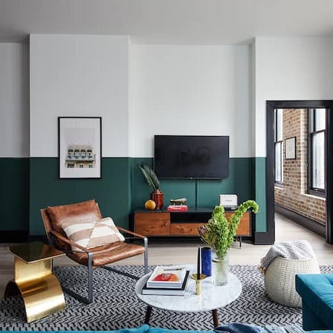 Stream your favourite TV shows and movies in the chic living area