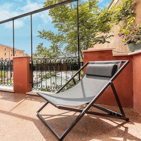 Catch some rays on the terrace's sun lounger