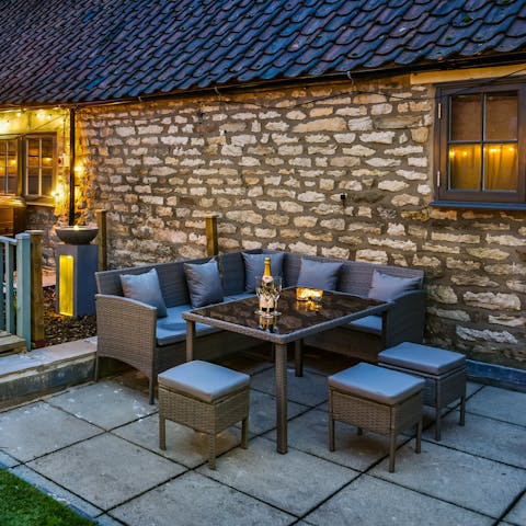 Raise a toast in the relaxing outdoor seating area