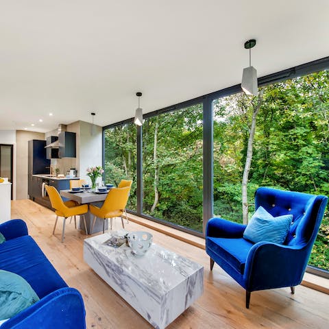 Take in the woodland and river views from the fully glazed frontage – this home is one of a kind