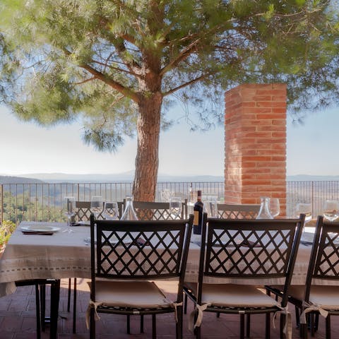 Enjoy a delicious Italian feast and a glass of local wine on the terrace