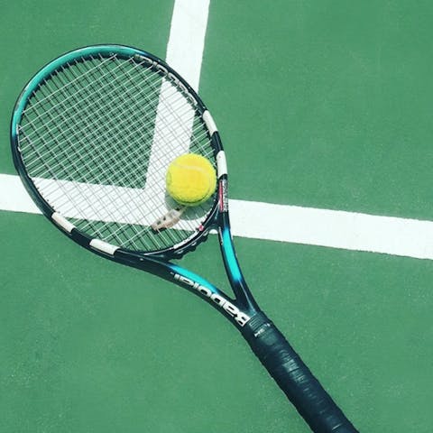 Challenge a loved one to a game of tennis at the shared courts