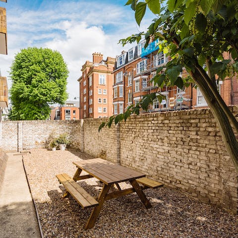 Make the most of the building's outdoor space with late-night drinks in the courtyard garden