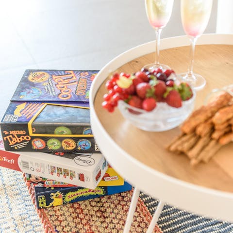 Put together some nibbles and have a games night in the stylish living space