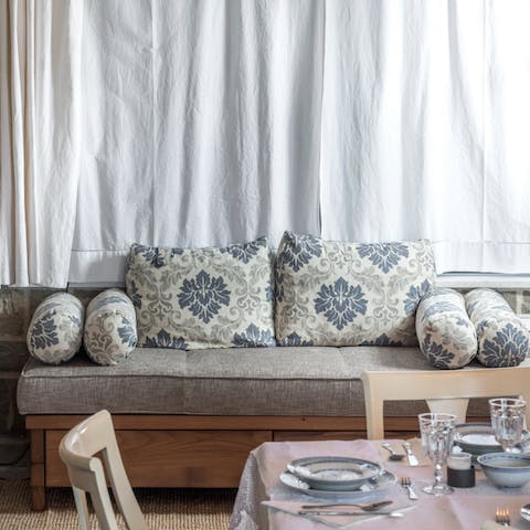 Curl up on the loveseat with a good book and a glass of wine