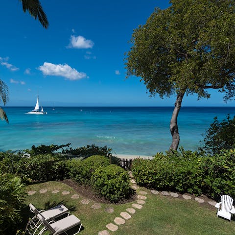 Lie back with a book in the garden, which is just a few metres from a beautiful beach