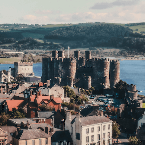 Drive down to Conwy and visit its famous castle fortress on the river
