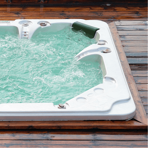 Unwind after a day of exploring with a soak in the hot tub