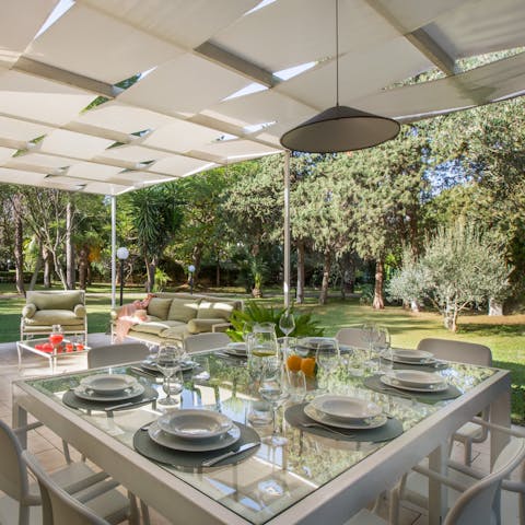 Dine alfresco under the shade of the veranda as the kids play in the pool