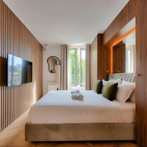 Get some rest in the sleek bedroom after a long day of sightseeing