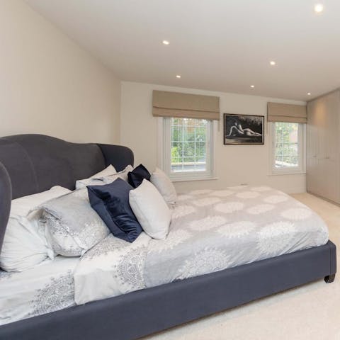 Cosy up in the comfortable master bedroom