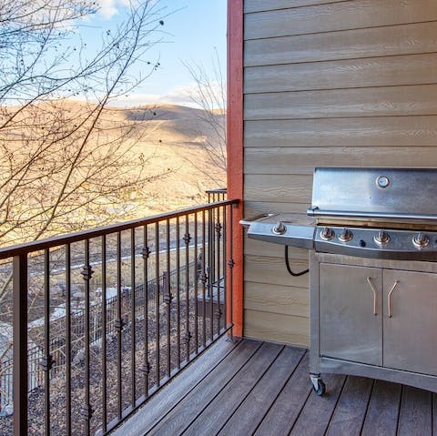Light the barbecue and cook your evening feast on the balcony