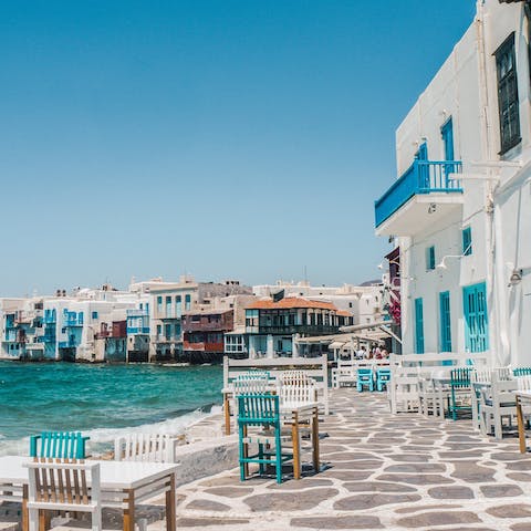 Discover the majestic charm of Mykonos from the heart of this beautiful home