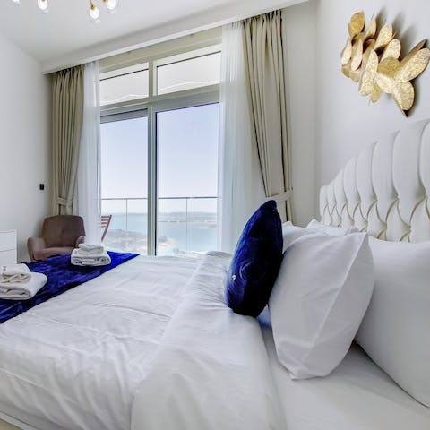 Wake up to views of the water from the king-size bed