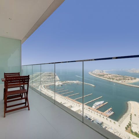 Admire the seascape from the private balcony