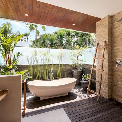 Hop in the free-standing tub and bathe in the sun after surfing at Canggu