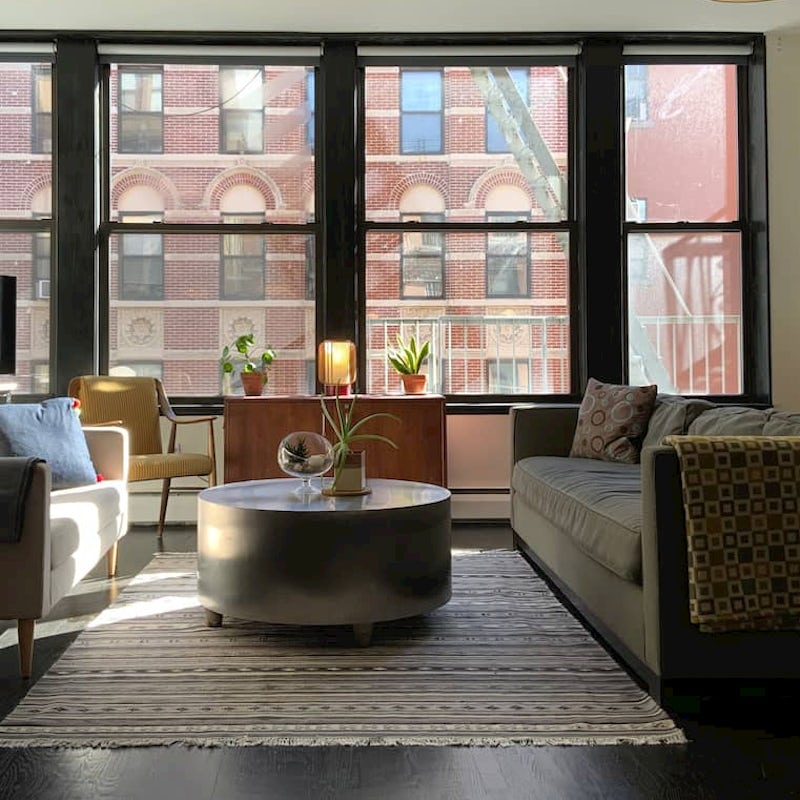 Watch the world pass you by from the enormous living room window