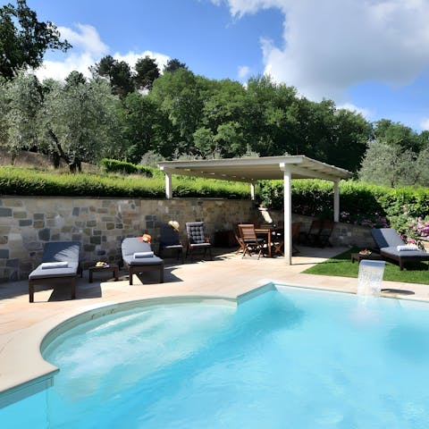 Relax and soak up the sun by the private pool 